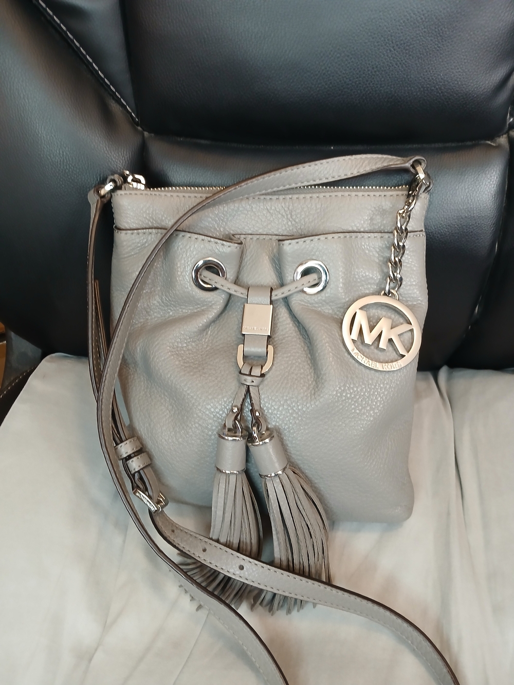 Michael Kors Silver-Gray Pebbled Leather Tassel Drawstring Crossbody